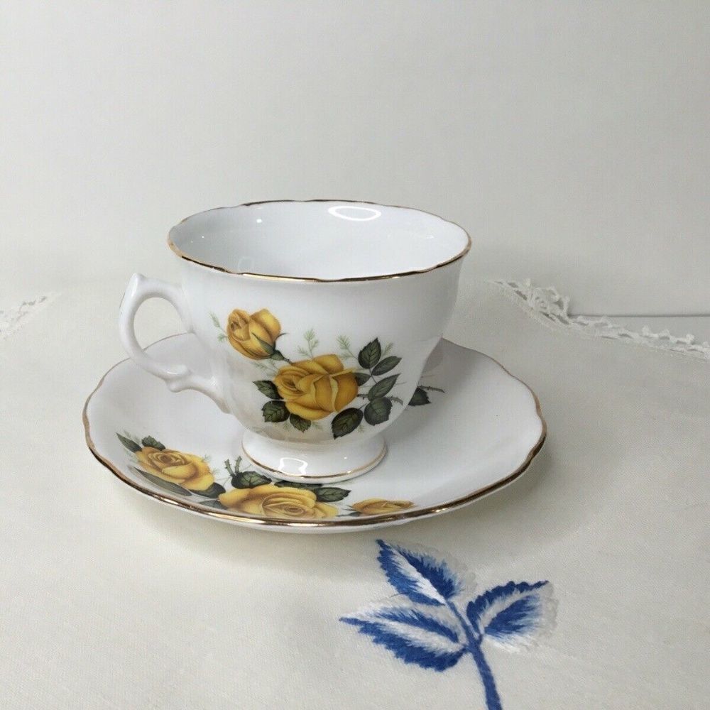 Royal Vale Yellow/Green Rose Tea Cup & Saucer Set Bone China England